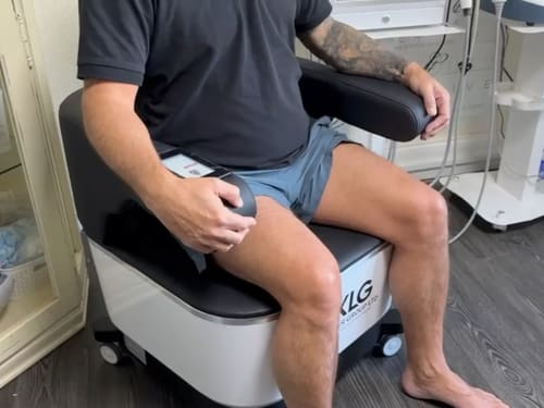 A male client receiving EMS pelvic floor therapy. The client is sitting comfortably on the Emchair treatment chair.