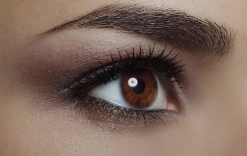 Close up photograph of beautiful lash extensions