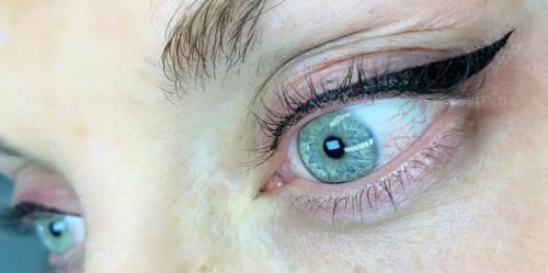 Photo of client after eyeliner treatment