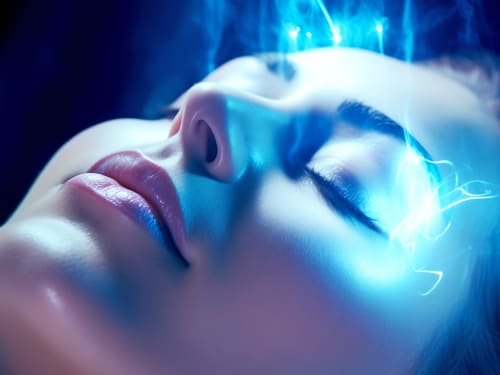 Conceptual image of plasma skin therapy showing a woman's face bathed in blue plasma light energy